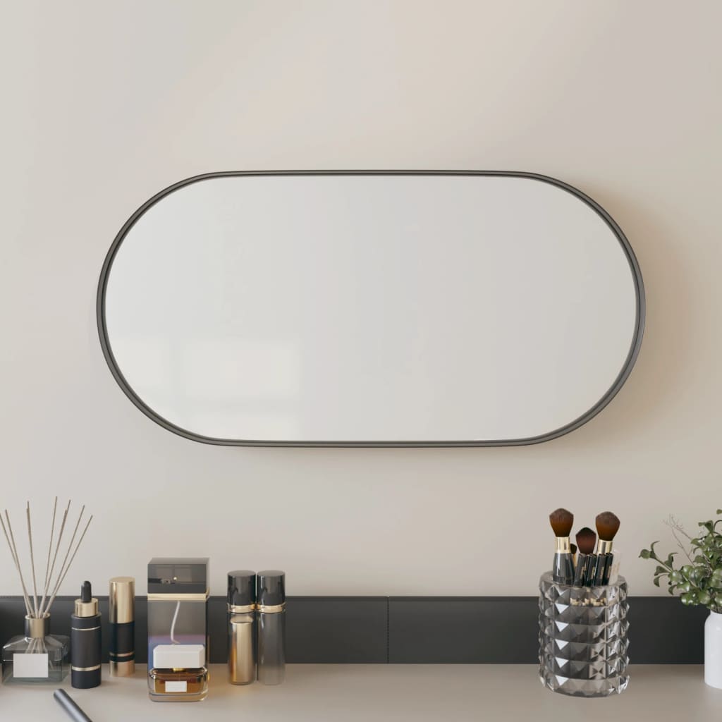 vidaXL Nástěnné zrcadlo černé 20x40 cm oválné