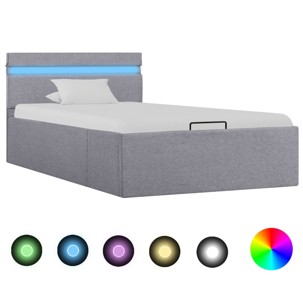 vidaXL Rám postele s úložným prostorem LED světle šedý textil 90x200cm