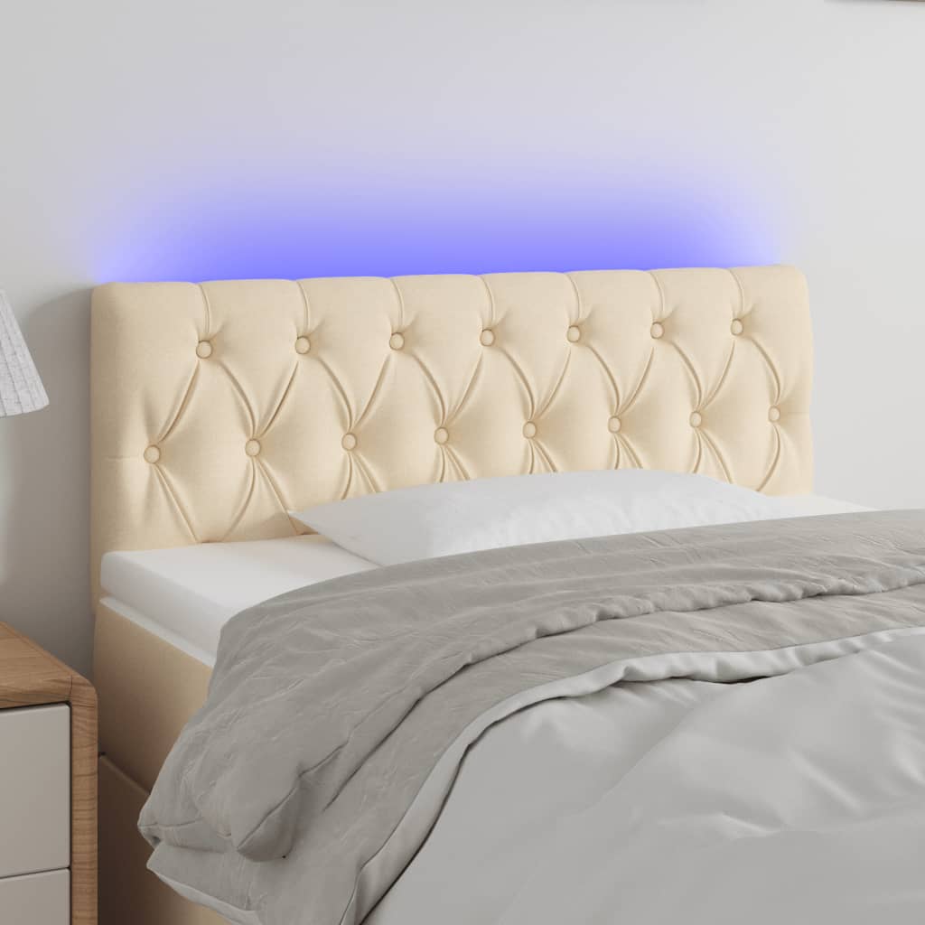 vidaXL Čelo postele s LED krémové 100 x 7 x 78/88 cm textil